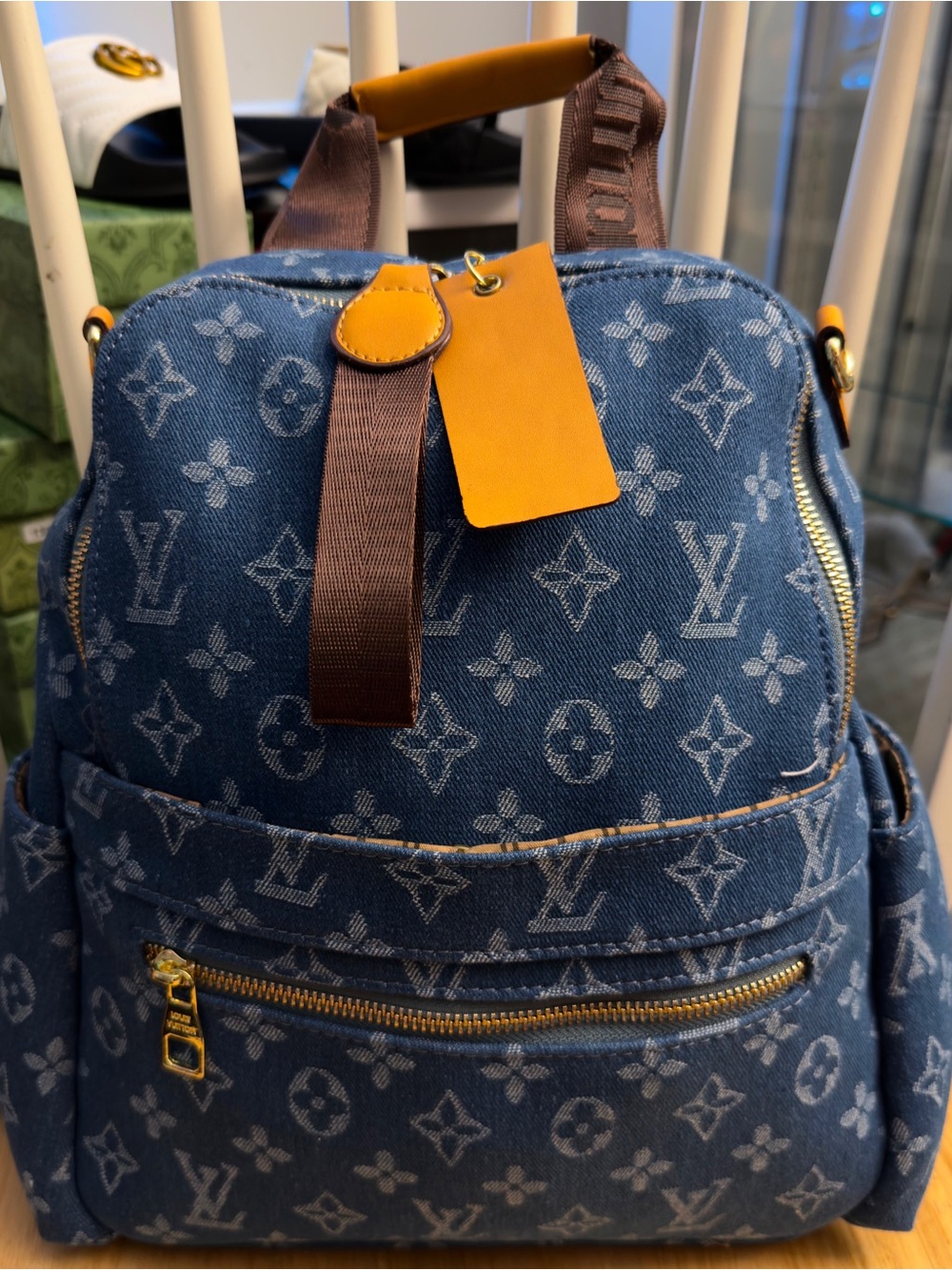 Louis Vuitton Denim Monogram Backpack with Gold Hardware and Tan Accents